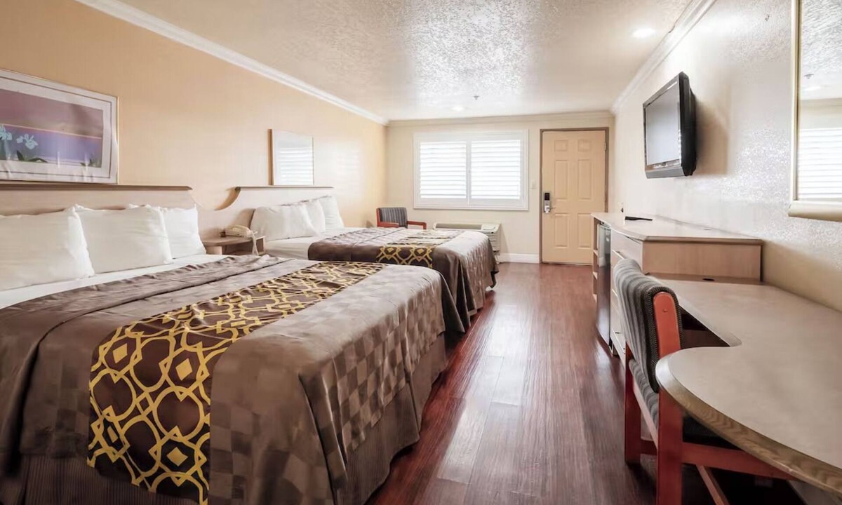 Corcoran Hotel | 3 Simple Rooms w/Essential Comforts for Family Getaways Near Corcoran Station