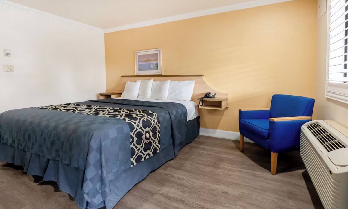 Corcoran Hotel | Charming Room with Private Bath & TV, Close to Parks & Popular Attractions