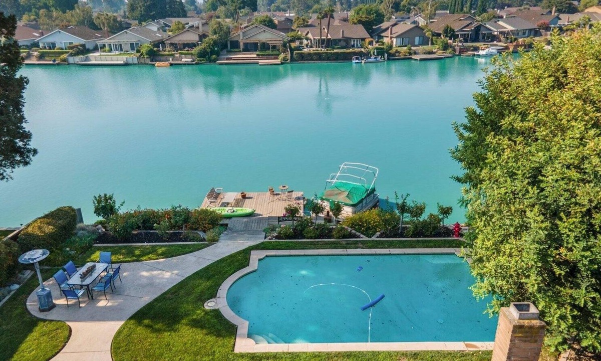 Stockton House | Cozy Home on a Lake and a sparkling pool with lush garden and Dock!