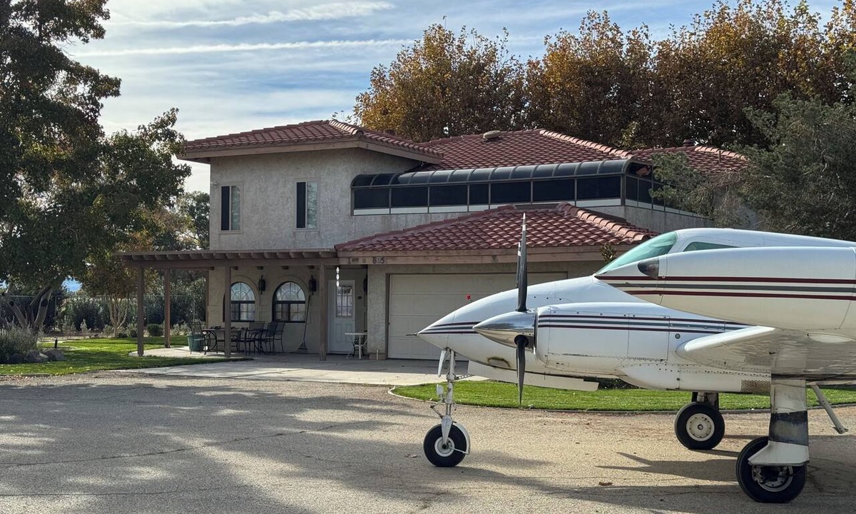 Lancaster House | Fabulous Spanish-style home in the country with an aviation theme.