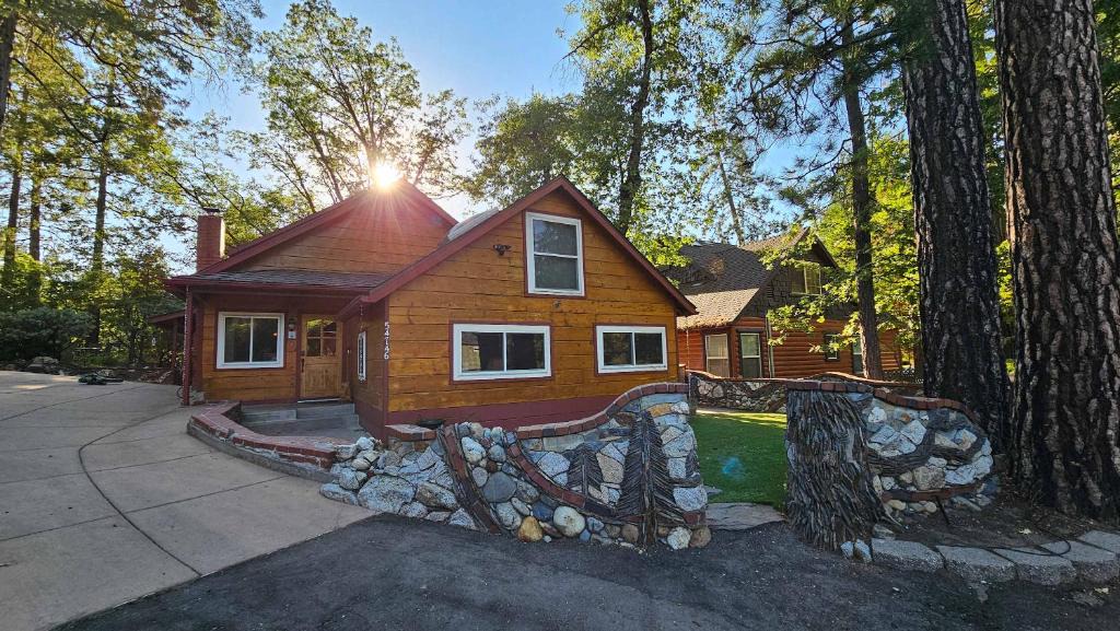 Bass Lake House | Knotty Pine Cabin with Artisan Stone Patio - Walk to Bass Lake