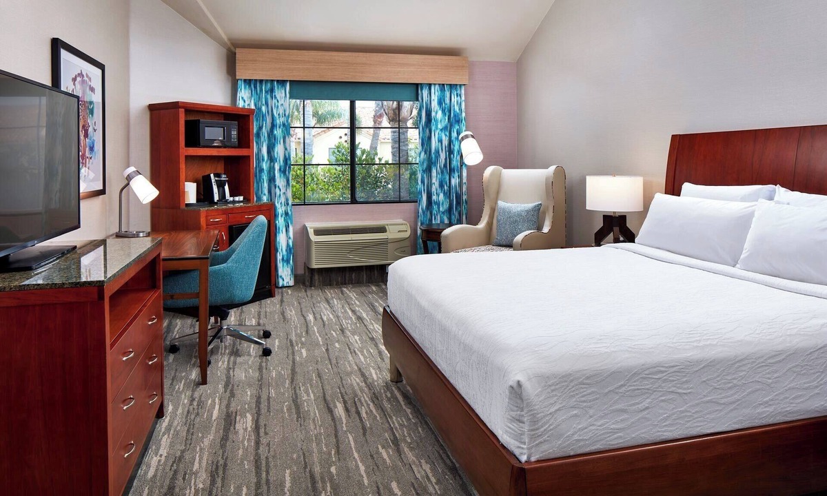 Valencia Hotel | Polished King Guestroom | Fenced Outdoor Heated Pool, Hot Tub & Courtyard Access