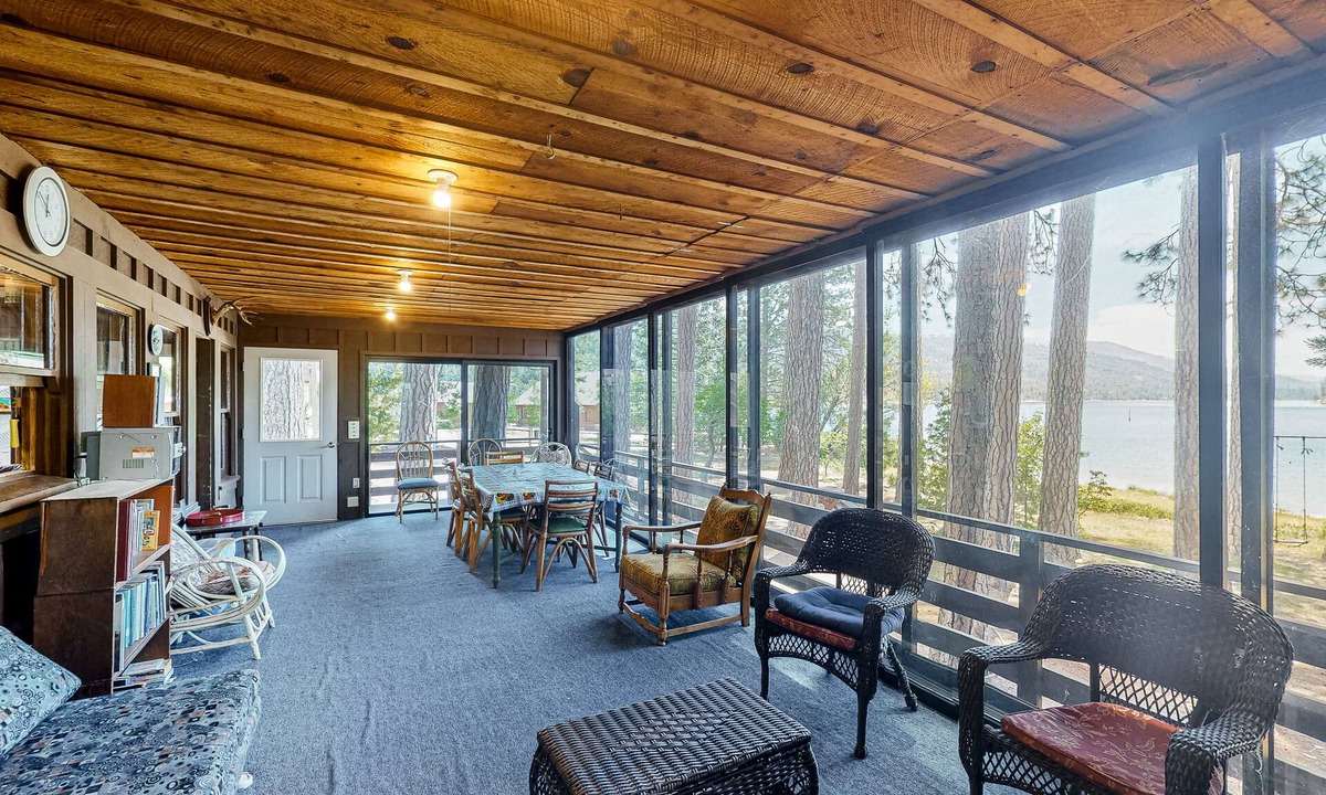 Bass Lake Cabin | Rustic, lakefront cabin with private dock, beach, screened porch & great view