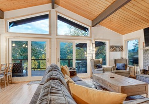Renovated mountain-view cabin with hot tub, huge deck, grill, & fireplace in Divide