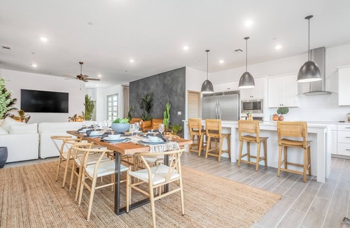 Friant House | 4 Bed 3 Ba Home near Lake with Chef’s Kitchen, Private Gym, & Attached Suite.