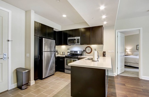 Downtown Apartment | 4th floor 2bedroom/2bath with private patio overlooking the meditation garden!