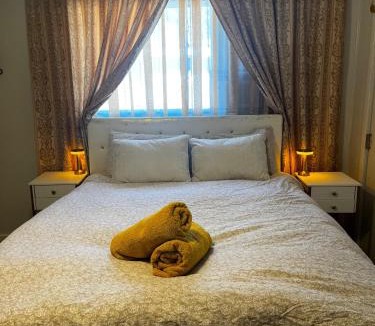 Bodfish House | Boutique Elegant Gold Room Kitchenette With EV Charger
