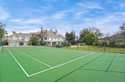 Chatsworth House | Castle style house with tennis court and pool in Los Angeles