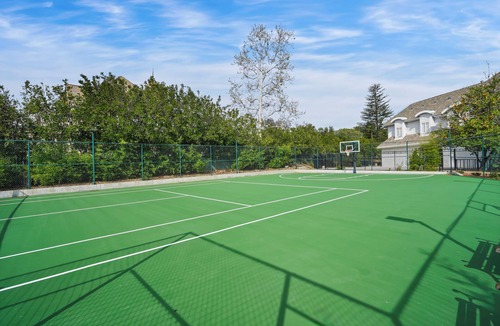 Chatsworth House | Castle style house with tennis court and pool in Los Angeles