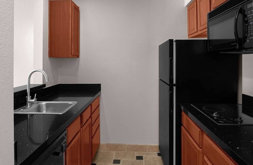 Downtown Hotel | Central Location: 1BR Suite w/ Full Kitchen & Balcony - Complimentary Amenities