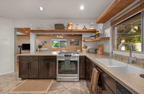 Bass Lake House | Charming Bass Lake cabin; roomy bedrooms; huge front deck; back patio w/fire-pit