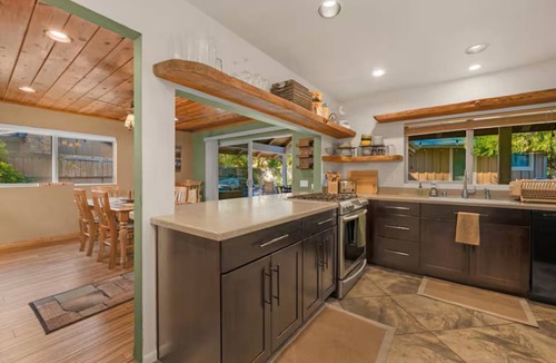 Bass Lake House | Charming Bass Lake cabin; roomy bedrooms; huge front deck; back patio w/fire-pit