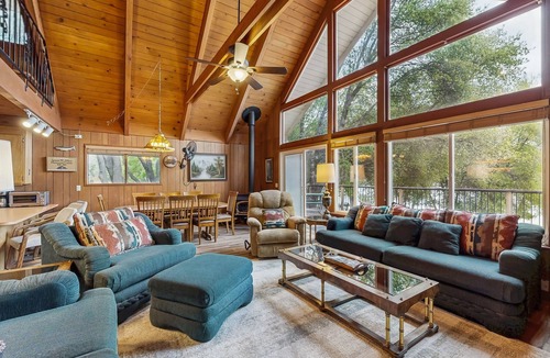 Groveland Cabin | Charming lakeside cabin with private beach, mountain views, and wood stove