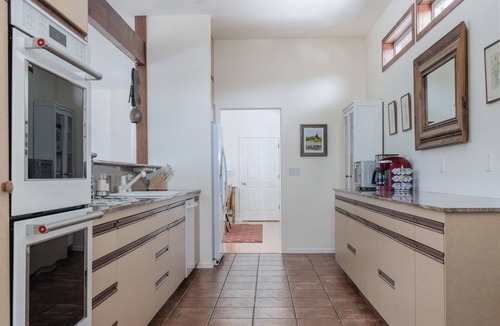 Arnold House | CHESA MADRISA - Vacation Elevated - Open Floor Plan Chalet + Wall of Windows