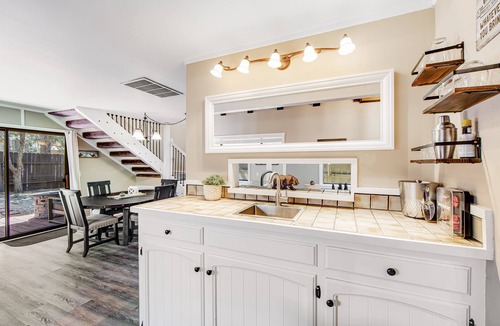 Woodlands Cabin | Classy home with hot tub, tiered decks, firepit, fenced yard & 2 dogs welcome