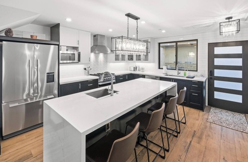 Big Bear Lake Condo | Clip In and Ride Straight Onto Chair 9 at Bear Mountain! Private HOT TUB! Air Conditioning! Pickle Ball Court! EV Charger!