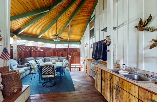Bass Lake House | Dog-friendly, lake view home with a boat slip, three decks, & WiFi