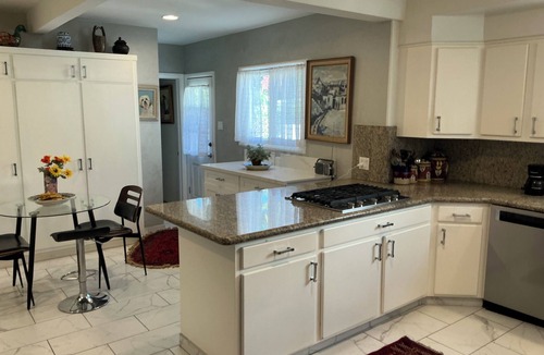 Mid City House | Garden with two hundred fruit trees and swimming pool