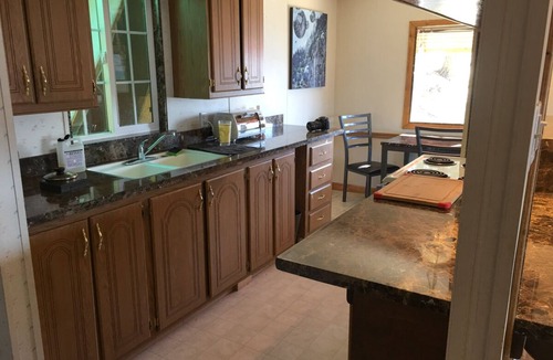 Wofford Heights Cabin | High on a mountainside with a hot tub on a deck.