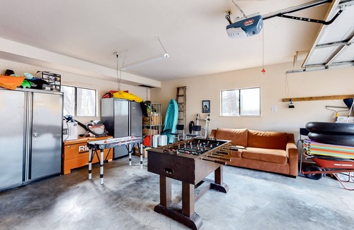 Groveland House | Home with private hot tub & fireplace - walk to beach, two dogs OK
