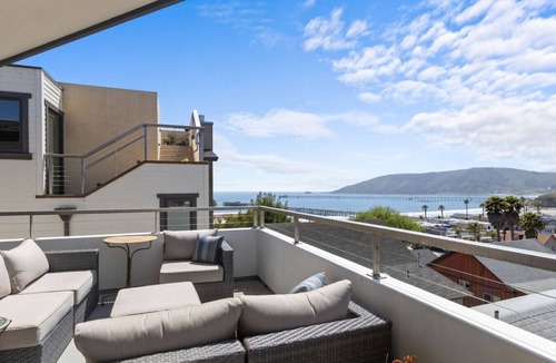 Avila Beach House | Hummingbird House — Private Rooftop Terrace, Panoramic Ocean & Pier Views, 2BR/2BA Luxury Home · Steps to Avila Beach · Fireplace · Gourmet Kitchen · Beach Gear & Bikes Included · Sleeps 5 · Managed by Solmaré Stays