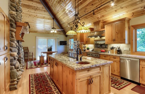 Bass Lake House | Majestic mountain lodge with private dock and shoreline
