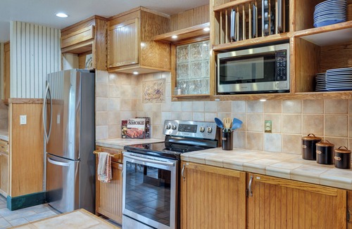 Sierra Village Cabin | Mi-Wuk Village Vacation Rental w/Multi-Level Deck