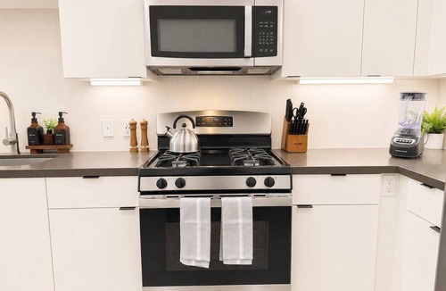 Lyon Street Apartment | Modern Apartment w/Pool & Gym Near Disneyland