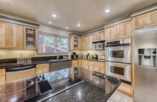 Zephyr Cove Cabin | Modern cabin with fireplace, spacious deck, & beautiful forest views, sleeps 6