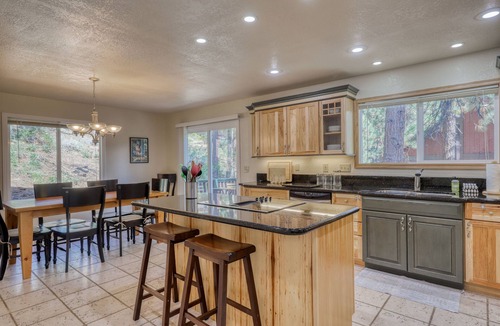 Zephyr Cove Cabin | Modern cabin with fireplace, spacious deck, & beautiful forest views, sleeps 6