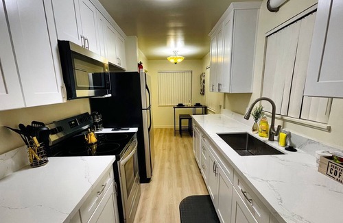 Midtown Sacramento Apartment | Movie Lover’s Themed Home! Queen suite + Snacks Included + HUGE TV!