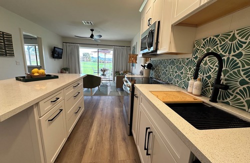 Lake Havasu City Condo | Ooh LaLa! Newly Listed Queens Bay All-Season Resort. On the Greens w/lake view