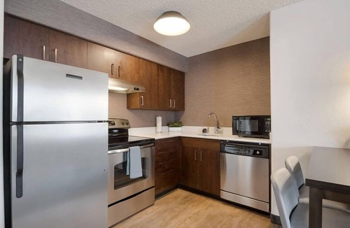 Reno/Tahoe Airport Hotel | Pet-friendly Property! w/Full Kitchen, Onsite Parking, FREE Breakfast!