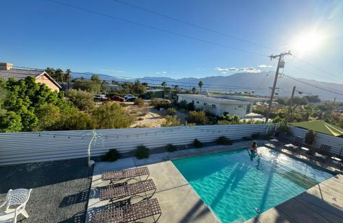 B-Bar-H Ranch House | Private oasis with pool spa firepit game room and Mountain Views Enjoy the sun longer