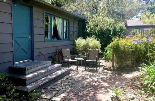 Northeast Carmel Apartment | Quintessential Carmel Writer's Hideaway with Private Garden and Patio.