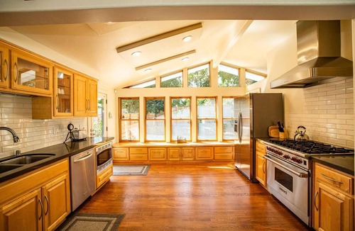 Cascade House | Riverside holiday home sleeps 10