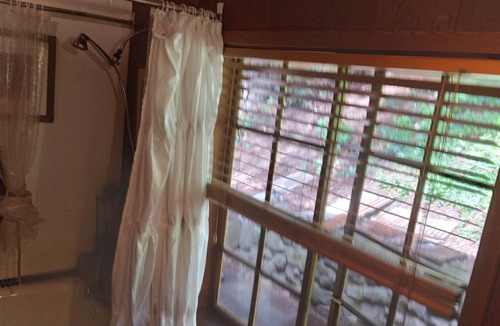 Redwood City Cabin | Rooms/tents in quaint original log cabin nestled in the Redwood trees on creek.