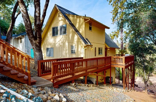 Groveland Cabin | Serene home with spacious deck, fireplace, loft, nearby amenities, dog friendly