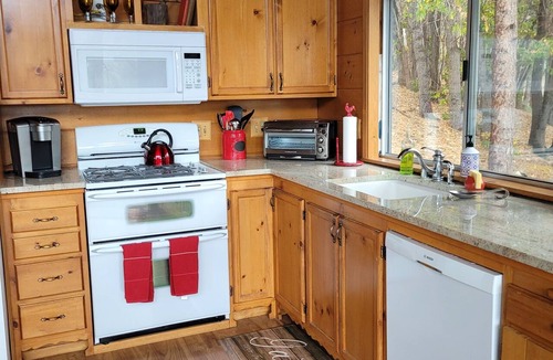 Green Valley Lake Cabin | Spacious 2-bedroom 2 bath cabin with one car attached garage and sunset views.