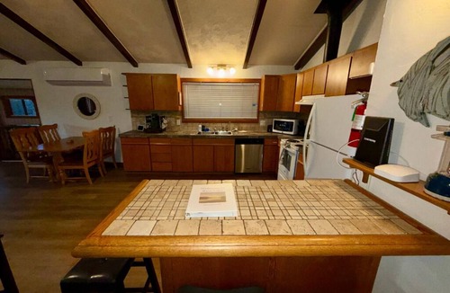 Bass Lake House | Spacious 2 Level Lakefront Retreat + Private Boat Slip/launch + Epic Views