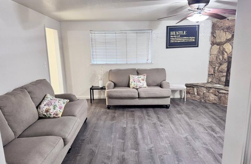 Raisin House | Spacious 4-bedroom house in charming Fresno with WiFi, AC, fitness room.