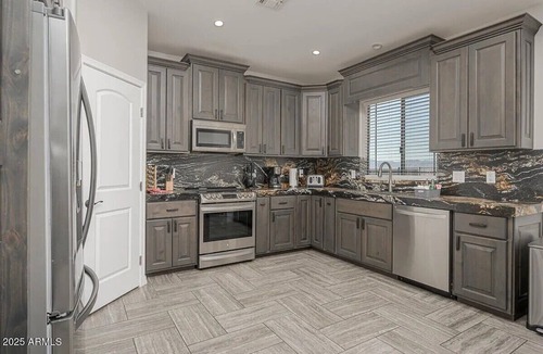 Sunridge Estates House | Sundance Lake Retreat! Spacious 4-bedroom house in serene Bullhead City!
