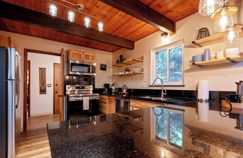 Camp Nelson Cabin | Trout River Cabin Secluded Family Forest Retreat