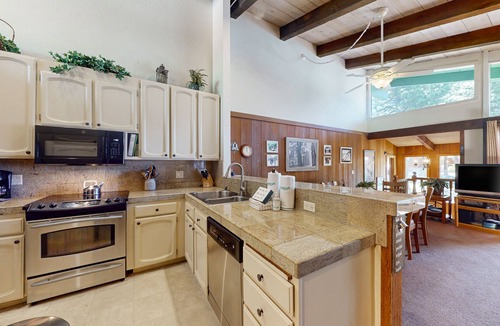 Mammoth Lakes Condo | Two-story condo w/mountain views, balcony, gas grill, & wood-burning fireplace