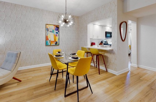 Palm Springs Apartment | Vibrant dog-friendly condo with hot tub, tennis court, pool, W/D, grill & patio