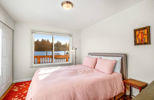 Rollingbay House | Waterfront home on Puget Sound lagoon with canoe & rowboat