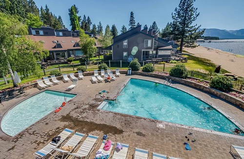 South Lake Tahoe Condo | Your next vacation getaway is less than 200 steps to a private beach on the lake