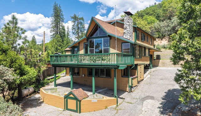 Bass Lake luxury cabin with lake views & boat slip