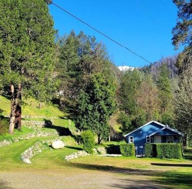 Beautiful Blue Cabin Nestled on a Hill with Beautiful Mountain Views for a Relaxing Getaway by the Trinity River in California