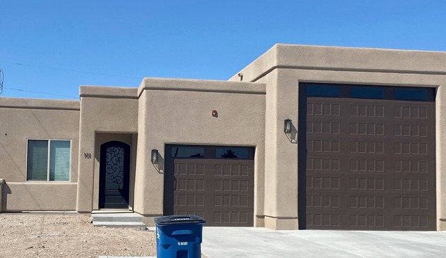 Brand new home, 55 ft garage. 3 bedrooms, sleeps 10. 18ft high garage door.